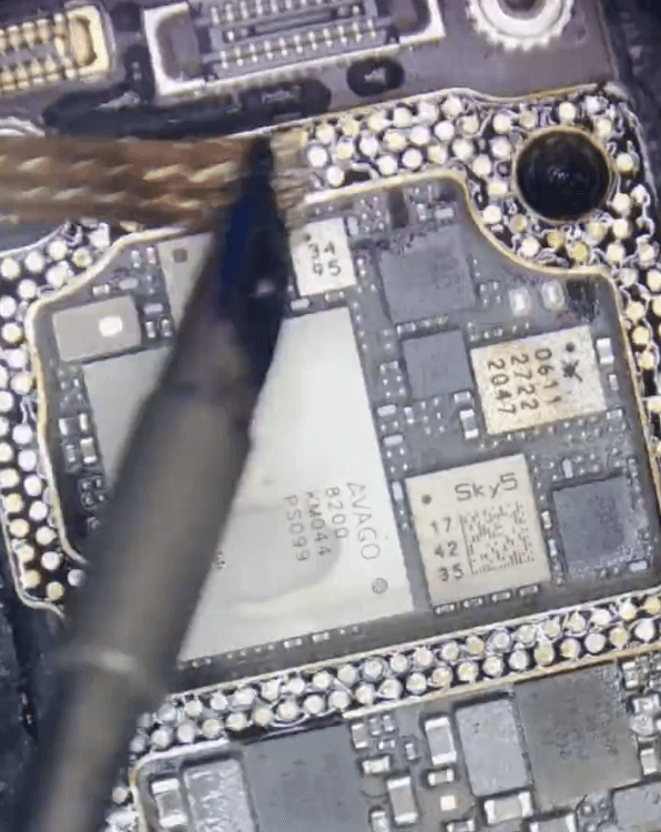 12 Clean the pads on the middle layers then rebonding the two layers of the motherboard