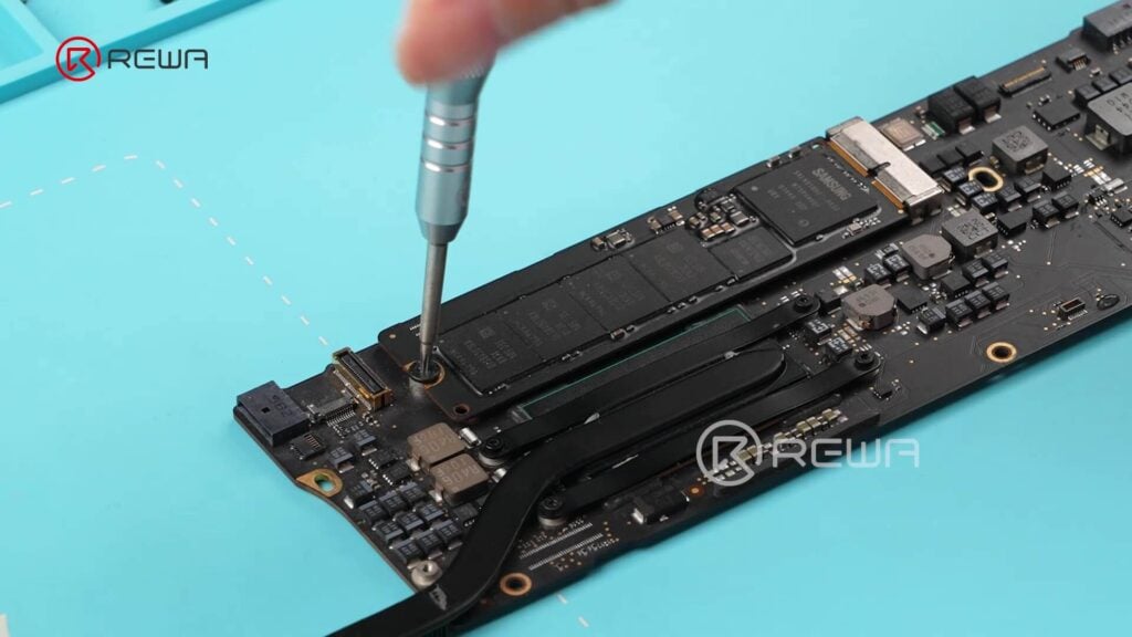unscrew to remove macbook ssd
