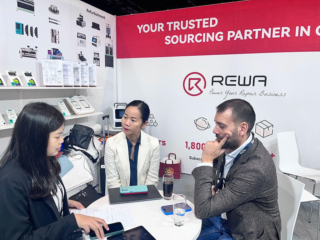 REWA Team Engaging with Visitors