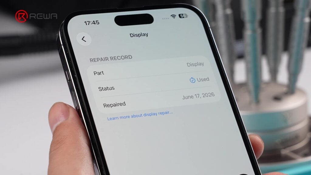 fix iphone unknown part message using diagnostic-compatible parts a hand holding an iPhone showing repair record