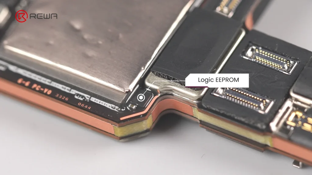 iphone 18 pro teardown: what changed inside and how does it affect repairability Exposed Logic EEPROM on Motherboard Surface