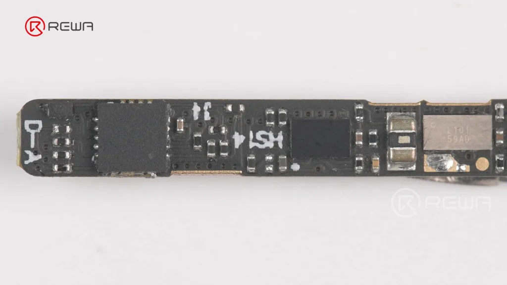 how iphone aftermarket battery bms boards are made Close-up view of a populated black iPhone battery BMS circuit board with surface-mounted chips and electronic components