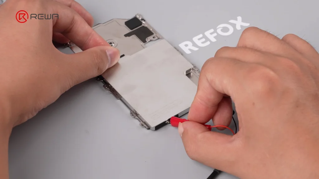 iphone 18 pro teardown: what changed inside and how does it affect repairability releasing battery adhesive using 9v dc voltage